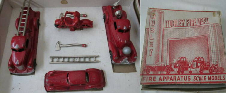 Hubley vehicle Fire Department set No. 30 + box 1937: Hubley vehicle Fire Department set No. 30 with box 1937. The set includes ladder truck, water gun/spotlight truck, police motorcycle, Chief car along with two axes and an extra ladder. All of the