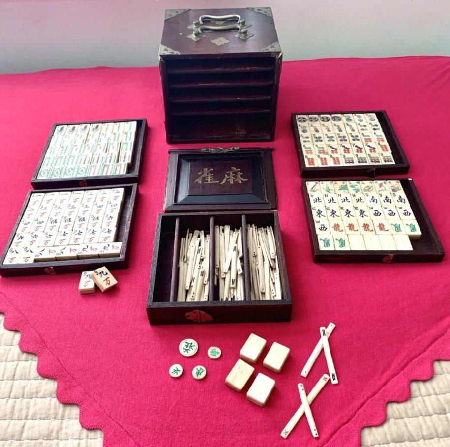 MAH JONGG Game SET + Books Wood/Brass Case 1920: MAH JONGG Game SET + Books Wood/Brass Case 1920HIGHLY COLLECTIBLE Antique Mah Jongg set, hand made in China in the 1920â€™s. Box made of solid wood embellished with decorative brass plates, handl