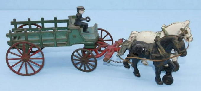 KENTON VEHICLE DRAWN HORSE WAGON 15.5" 1930: Kenton cast iron horse drawn wagon. Made in 1930's It is 15 1/2" long and 3 1/2" wide. There is some minor paint loss. The axel on the wagon is very slightly bent. It is all original including the