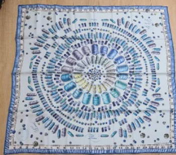 Longchamp 100% silk scarf: Longchamp 100% silk scarf. Blue shades of summer colors with yarn, buttons, and measures designs. A great enhancer to a elegant wardrobe Made in Italy Approx size 35" x 35"