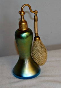 Steuben Atomizer De Vilibis Blue Aurene perfume Bottle: Steuben blue aurene perfume bottle with brass atomizer topped. Marks on underside say "Aurene"Steuben Aurene perfume bottle signed 1920iridescent blue / gold 6" height