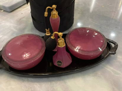 De Vilbiss Atomizer bottle a 7pc vanity set: De Vilbiss Atomizer bottle a 7pc vanity setTray, two covered boxes, and two perfume bottle atomizers. Striking pink black and gold. The short bottle is marked with the original label, the tall bottle