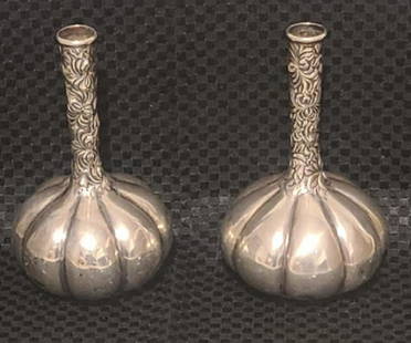 STERLING SILVER VASE PAIR SHEIBLER 1890-1910: George W. Shiebler Sterling Silver Vases 1890 pair of sterling silver vases dated 1890-1910. These pieces are hand embellished with rich and complex chasing and repousse along the tall narrow