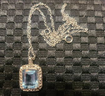 genuine topaz and diamond necklace: STERLING SILVER 3.50 CT GENUINE BLUE TOPAZ AND DIAMOND ACCENT EMERALD CUT PENDANT