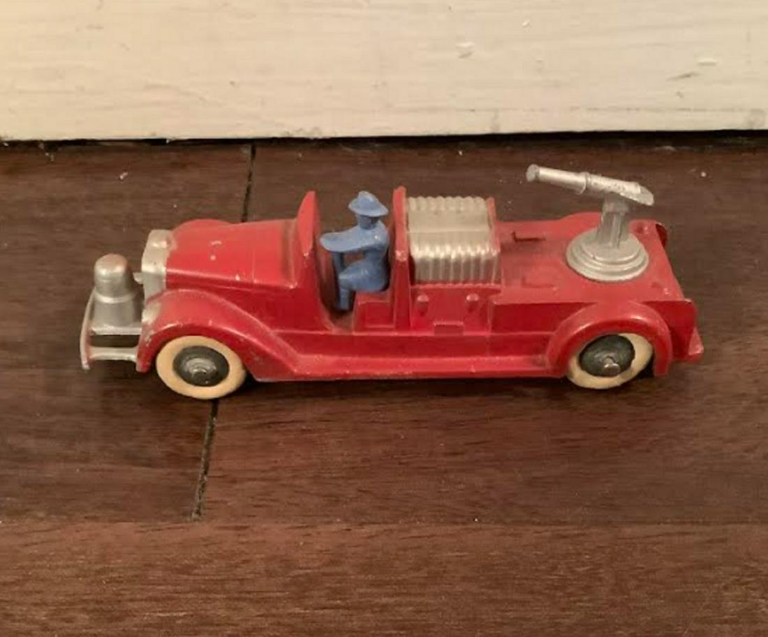 Tootsietoy vehicle fire truck with driver. makers mark: Tootsietoy vehicle fire truck with driver. makers mark