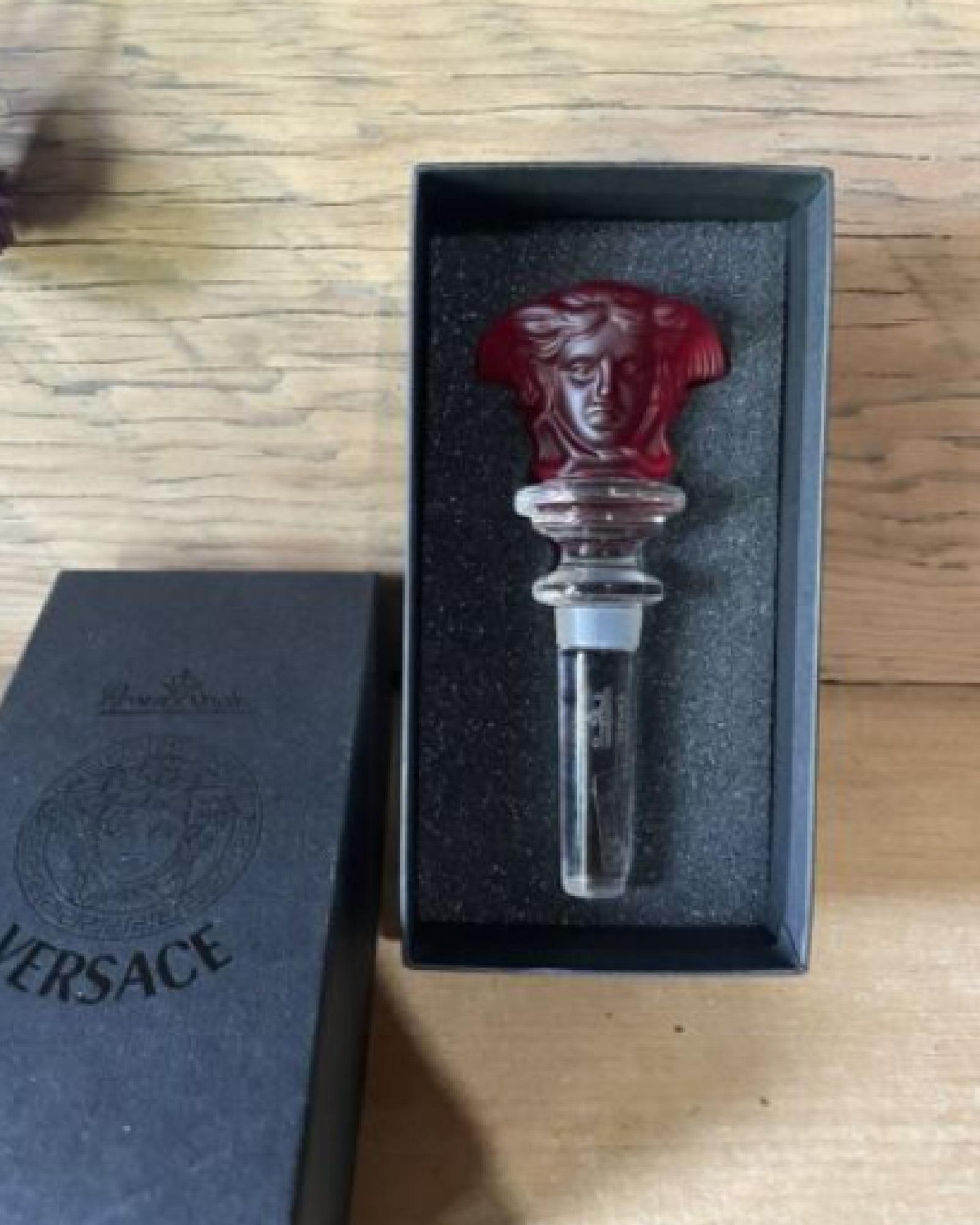 Versace Crystal Wine Stopper with box: Versace Crystal RED Frosted Double Sided Medusa Wine Stopper. Measures approx 5" lenght