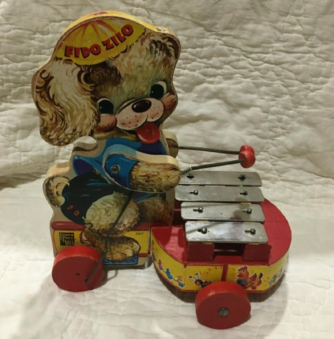 FISHER PRICE WOODEN FIDO ZILO # 707 WOOD PULL TOY Works: FISHER PRICE WOODEN FIDO ZILO # 707 WOOD PULL TOY missing pull but WORKS.