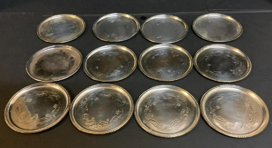 Georg Jensen Sterling Silver Coasters set of 12 PATTERN 51C MADE IN DENMARK: Georg Jensen Denmark Sterling Silver PATTERN 51C WITH MAKERS MARK Coasters set of 12 MEASURES APPROX 2 3/8"