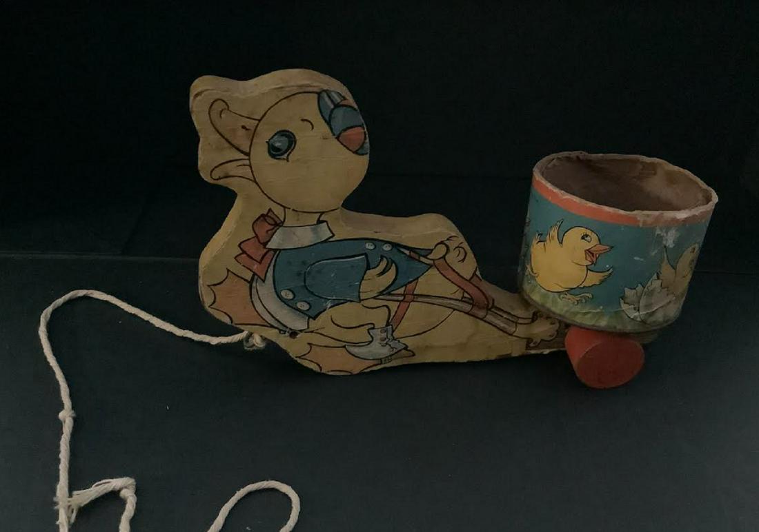 FISHER PRICE Ducky Cart No. 11 WOOD PULL TOY: FISHER PRICE Ducky Cart No. 11 WOOD PULL TOY Wood Body, Bright Paper , Chicks on Barrel. Measures approx 8 inches.
