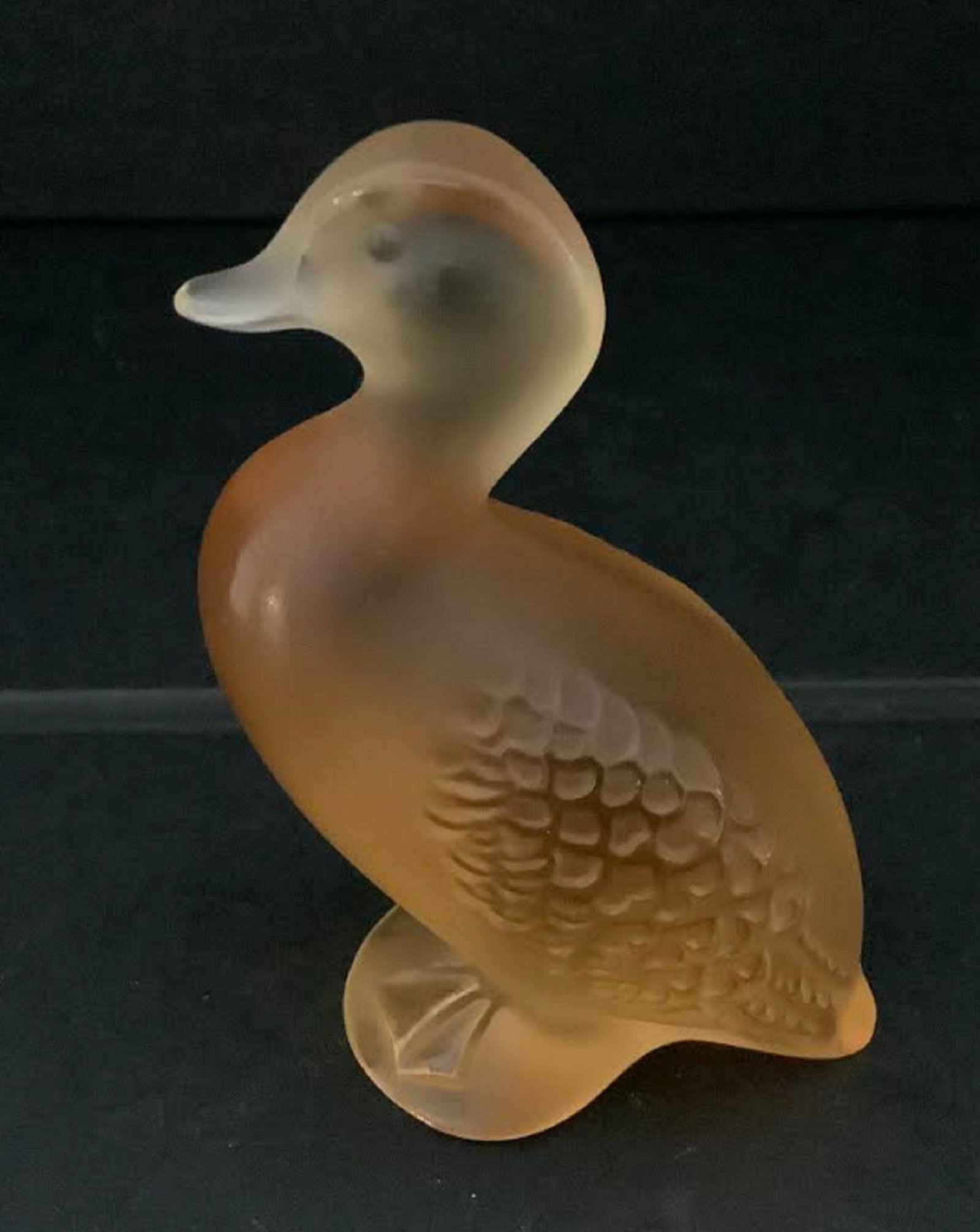 LALIQUE SIGNED AMBER CRYSTAL DUCK MADE IN FRANCE: LALIQUE SIGNED AMBER CRYSTAL DUCK MADE IN FRANCE. Measures 2.75 inch high