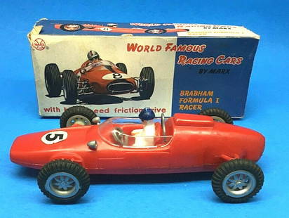 MARX ORIGINAL ROCKET RACER BRABHAM FORMULA 1 RACER IN ORIGINAL WITH BOX: MARX ORIGINAL ROCKET RACER BRABHAM FORMULA 1 RACER IN ORIGINAL WITH BOX. This car measures around 6 1/4 inches long. has a little play wear and the friction slips a little also the inside of the