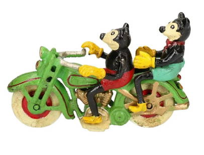 Disney Cast iron Mickey and Minnie Mouse On Motorcycle: Disney Cast iron Mickey and Minnie Mouse On Motorcycle. Disney Cast iron Mickey and Minnie Mouse On Motorcycle Cast iron.Bike painted Red / Green with White wheels.The bike wheels turn.Measures approx