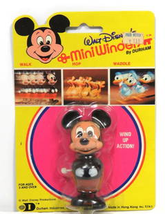 Disney Blister Pack Disneykins Minnie Mouse  WIND UP Figurine WALT DISNEY 1971: Disney Blister Pack Disneykins Minnie Mouse Wind Up Figurine. WALT DISNEY 1971 Vintage Mickey Mouse Walker Toy, unopened. MiniWinders by Durham Industries Wind-Up Toy Made in Hong Kong. This cute Walt