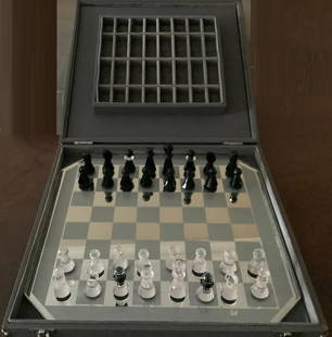 Swarovski Signed Chess SET Game With Original Box: Swarovski Signed Chess SET Game With Original Box. Includes crystal pieces, game board, stoarge case. Color: Clear & Black Approximate measurements - 14 5/8" x 14 5/8"