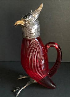 Spanish Sterling Silver RUBY RED CRYSTAL Figural Birds Decanter Cruet: standing bird decanter in red and colored crystal, with ruffled feather collars and naturalistic feet, gilded crests and beaks, hallmarked to mounts the pentagram Spanish sterling silver mark. measure