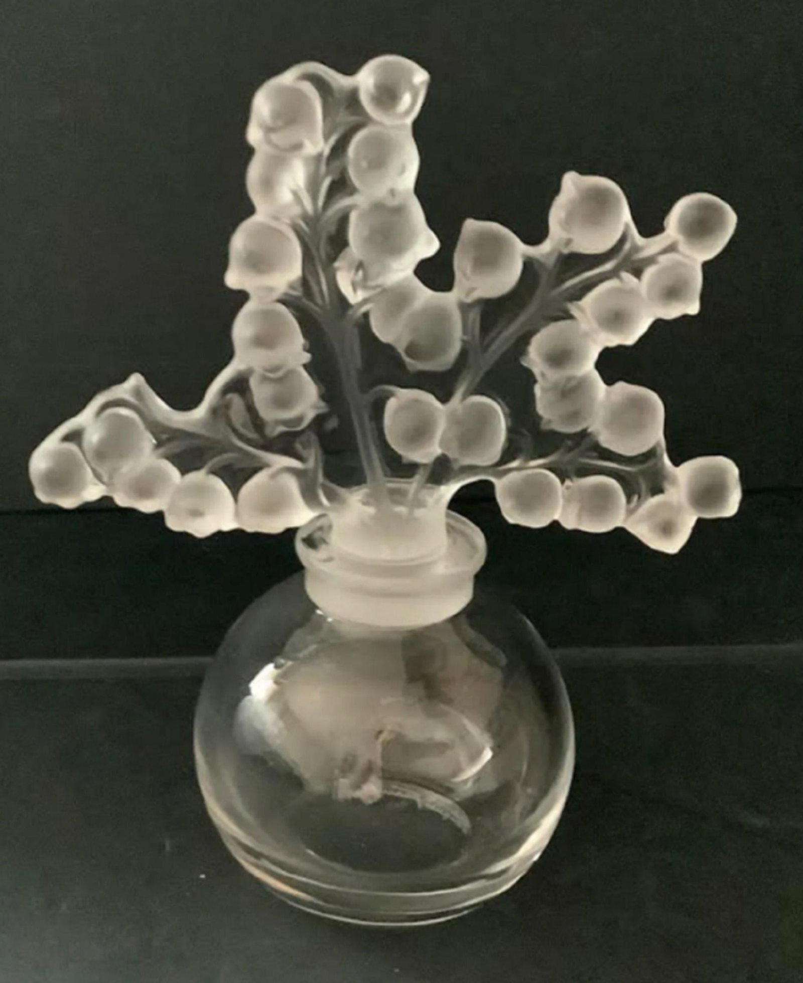 Lalique Signed Clairfontaine Lily of the Valley bottle France. Measures approx 4.5 to 5 inches tall: Lalique Signed Clairfontaine Lily of the Valley bottle France. Measures approx 4.5 to 5 inches tall with stopper in bottle The bottle is about 2 inches in diameter at its widest part and the floral de