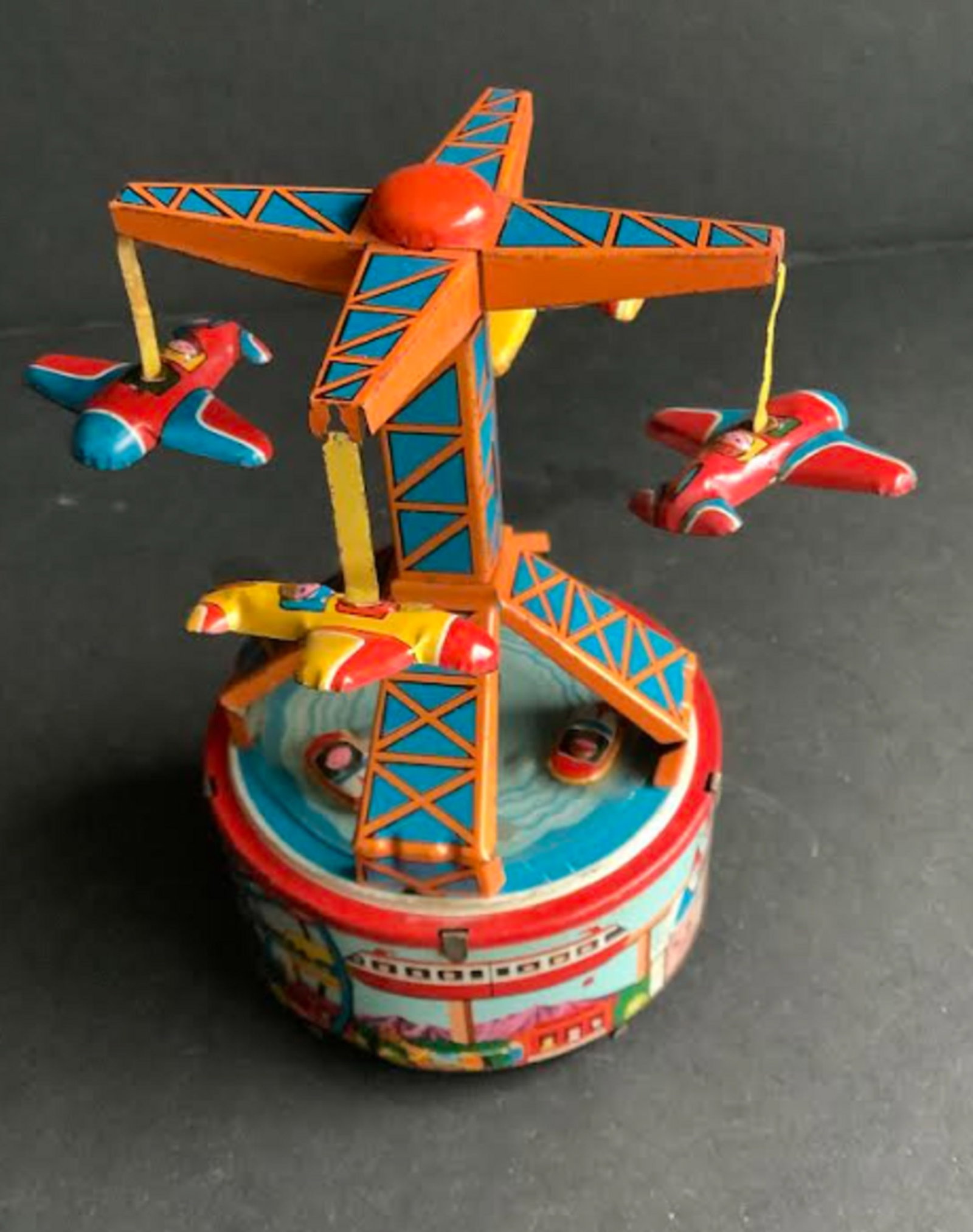 Yonezawa Tin TLitho Airplane Boat Ride Works! Made in Japan: Yonezawa Tin TLitho Airplane Boat Ride Works! Measures approx 5 inches wide and 5.5 inches tall Made in Japan
