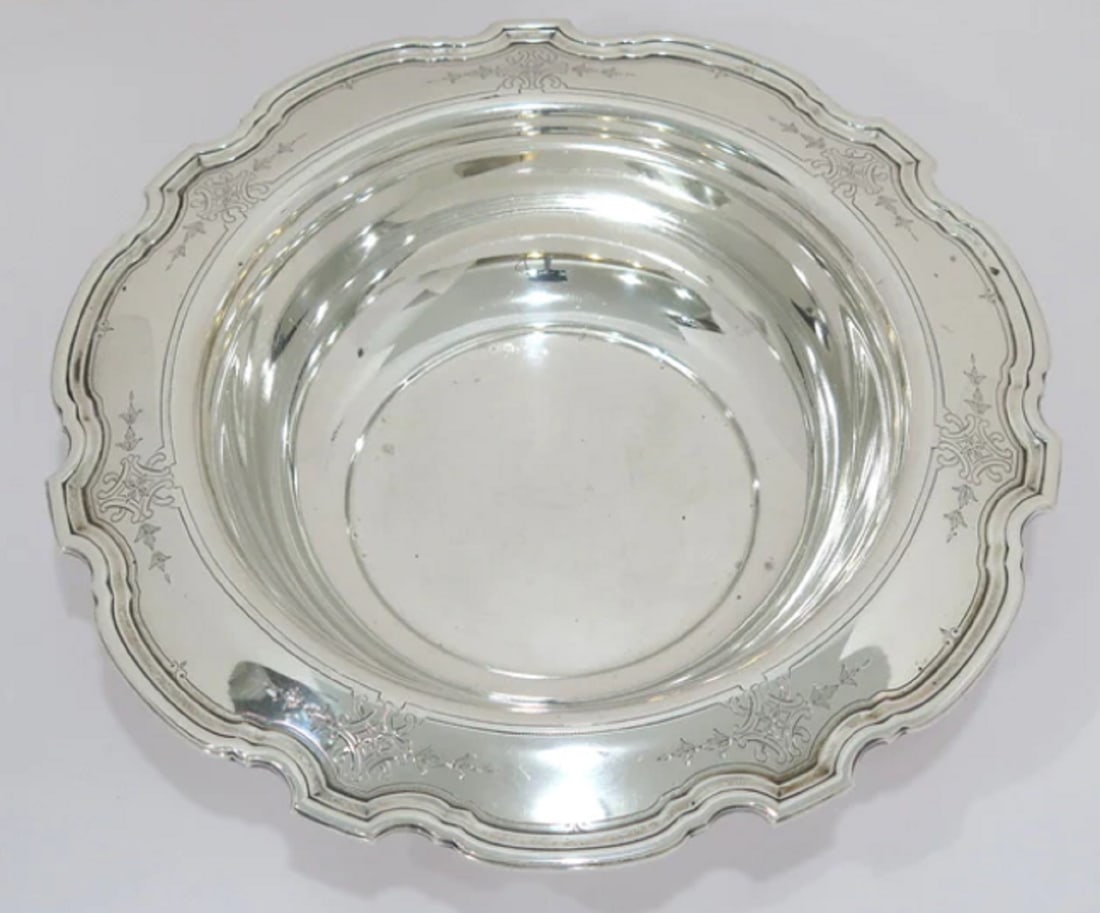 TIFFANY & CO STERLING SILVER ORNATE SERVING BOWL: TIFFANY & CO STERLING SILVER ORNATE SERVING BOWL Dimensions: 10 5/8 x 2.25 inWeight: 20.3 toz