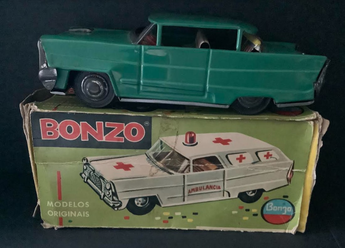 BONZO TIN FRICTION VEHICLE WITH BOX MADE IN BRASIL: BONZO TIN FRICTION VEHICLE WITH BOX MADE IN BRASIL Measures approx 7.25 inches long
