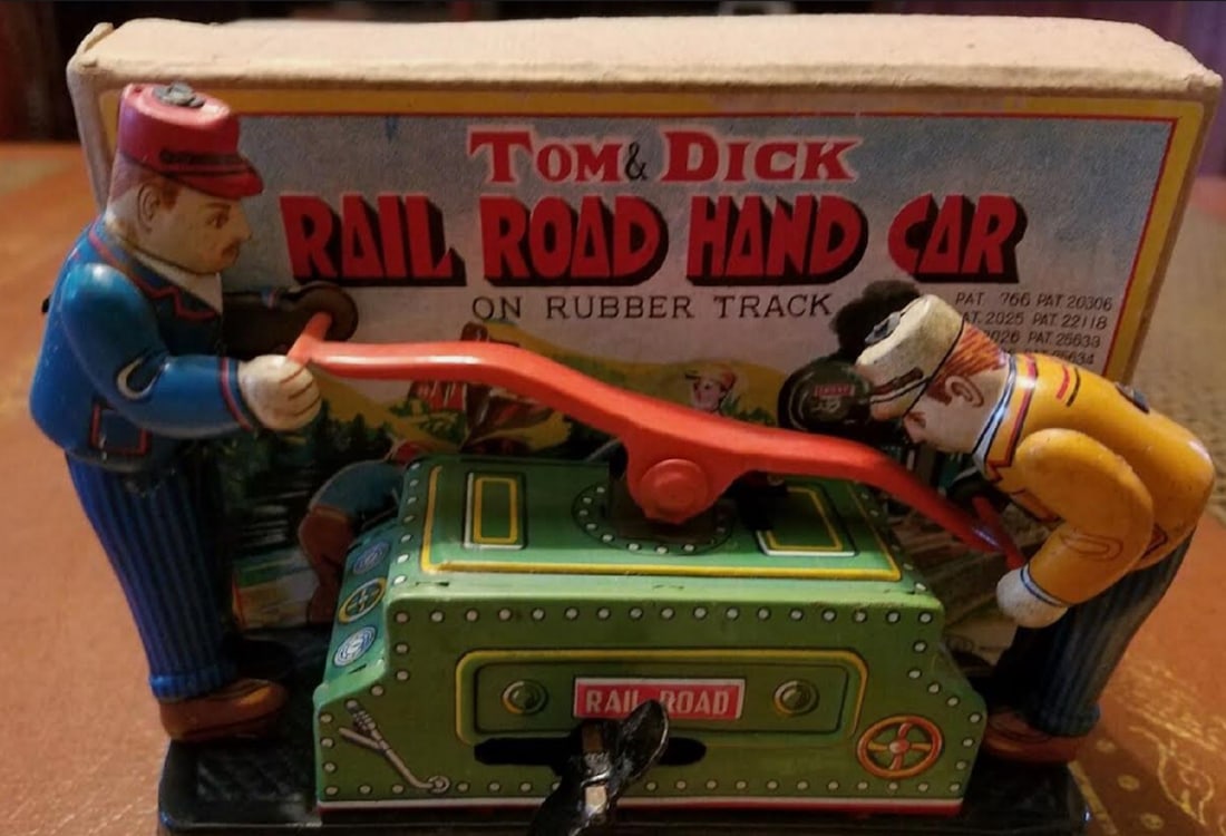 EXELO Tom And Dick Tin Wind Up Rail Road Hand Car Vehicl With Orig Box. Made in japan: EXELO Tom And Dick Tin Wind Up Rail Road Hand Car Vehicle. Made in japan in original box great condition. Measures approx 6 inches Lots of action when you wind the toy the toy