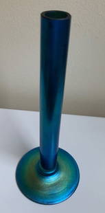 STEUBEN BLUE AURENE SIGNED BUD VASE 2556: STEUBEN BLUE AURENE SIGNED BUD VASE 2556 Measures approx 6 inches. Blue Aurene art glass produced by the Steuben Glass Co. during the Frederick Carder era. The vase is hand blown and finished with