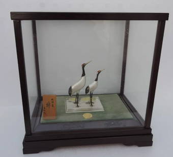 STERLING SILVER JAPANESE PAIR RED CRESTED TSURU BIRD CRANE LUCKY CHARMS OKIMONO: VINTAGE PAIR OF STERLING SILVER JAPANESE RED CRESTED TSURU CRANE BIRDS , HALLMARKED GIN-SEI (JAPANESE TERLING SILVER MARK), MOUNTED ON VELVET LINED WOODEN STAND AND COMES WITH COVER GLASS CASE. SIZE: