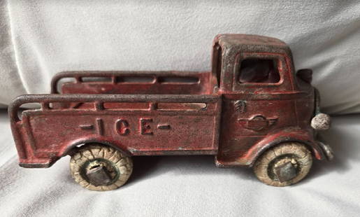 CAST IRON ICE TRUCK DELIVERY VEHICLE WITH DRIVER 1930: CAST IRON ICE TRUCK DELIVERY VEHICLE Measures approx 6 3/4 long by 2 inches deep