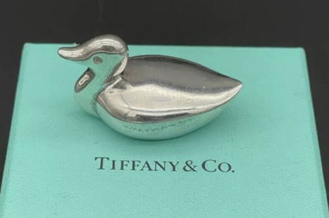 Tiffany & Co. Sterling Silver Duck Figurine Paperweight With Orig Box: Tiffany & Co. Sterling Silver Duck Figurine Paperweight With Orig Box Marked: “TIFFANY & Co MAKERS STERLING”. Weight: 81.1 Grams. Length: 1 10/16 Inches. Height: 1 Inch. Width: 1 Inch.