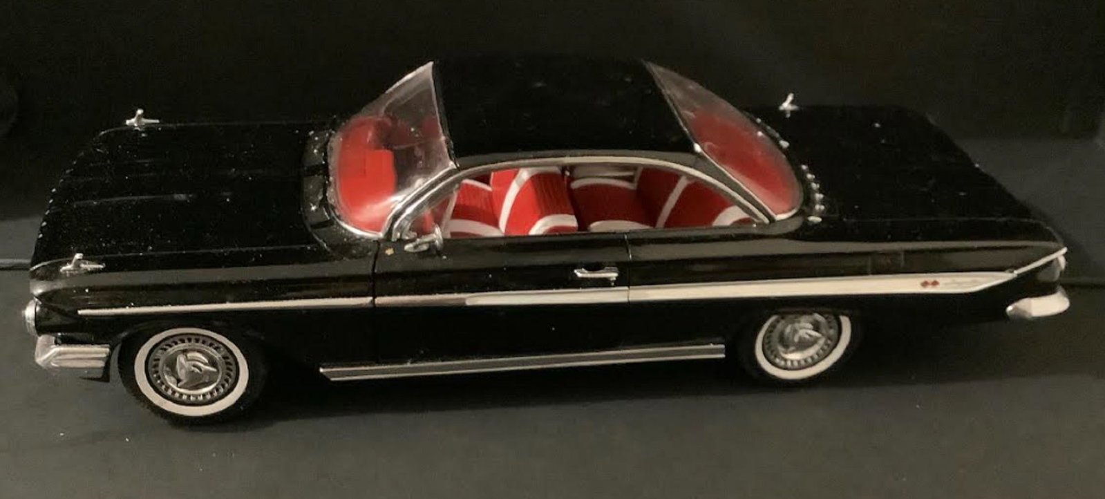 Cheverolet impala Vehicle 11 inches long 1961: Cheverolet impala Vehicle 11 inches long Measures approx 11.25 inches long by 4 inches wide