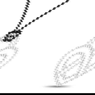 Poiray 18K White Gold 3.75ct Diamond Heart Necklace PPC8952: A grand display of style from Poiray, this large pendant necklace will steal your heart. The heart motif is shaped in 18K White Gold to mesmerizing effect. Its precious contours ripple with the