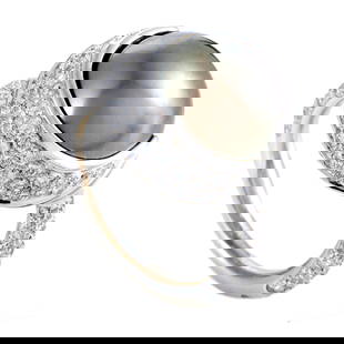 Chanel Womens 18K White Gold Diamond and 13.77mm Black Tahitian Pearl Ring: The stunning darkness and immaculately gleaming surface of the gorgeous 13.70mm Tahitian pearl brilliantly contrast the bright sparkling diamonds weighing in total 0.75ct to create a fascinating