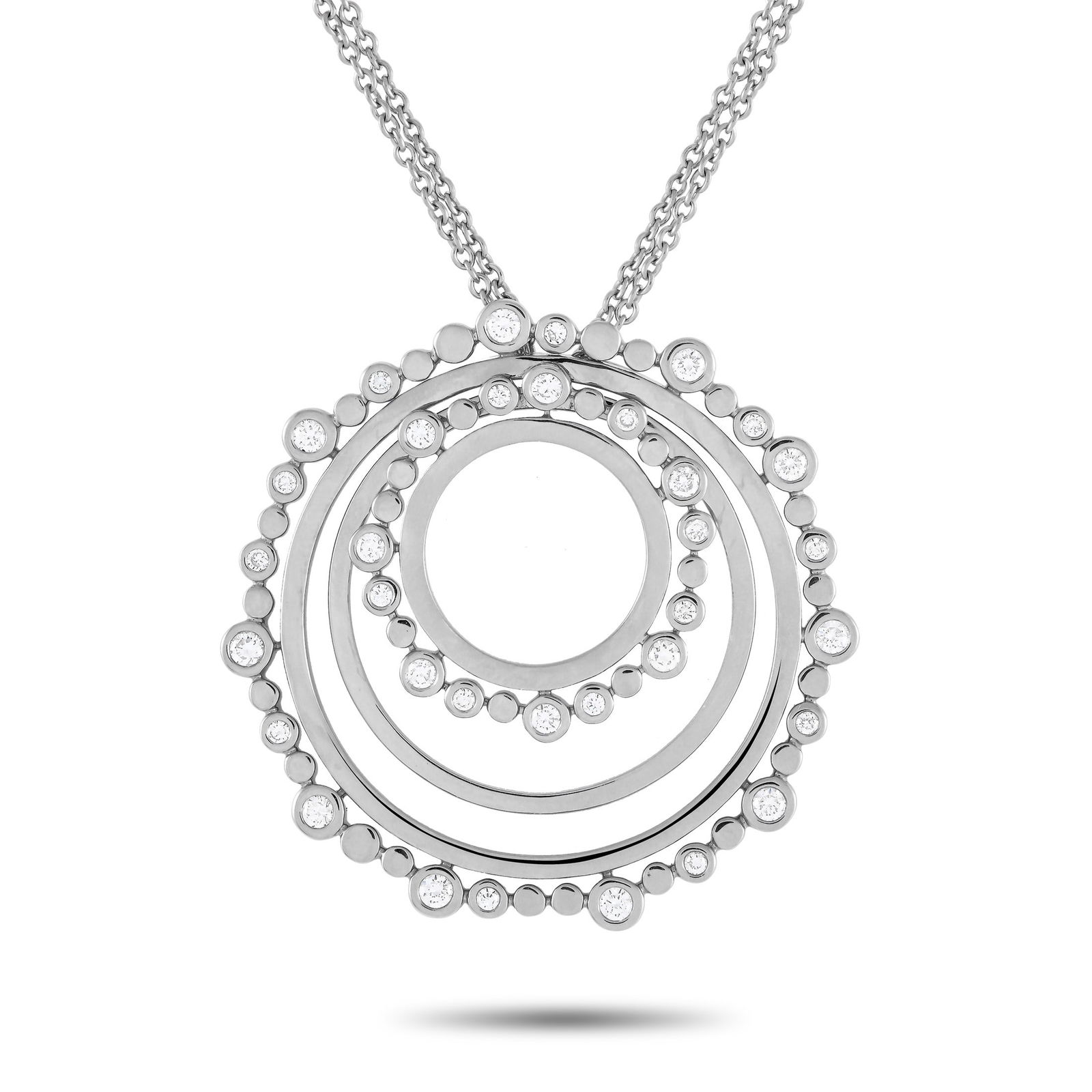Bucherer 18K White Gold 0.69ct Diamond Circle Necklace: A versatile jewel you can wear time and time again. This white gold necklace by Bucherer features a 30-inch-long double chain holding a round pendant with concentric circles. The 1.5-inch-wide pendant