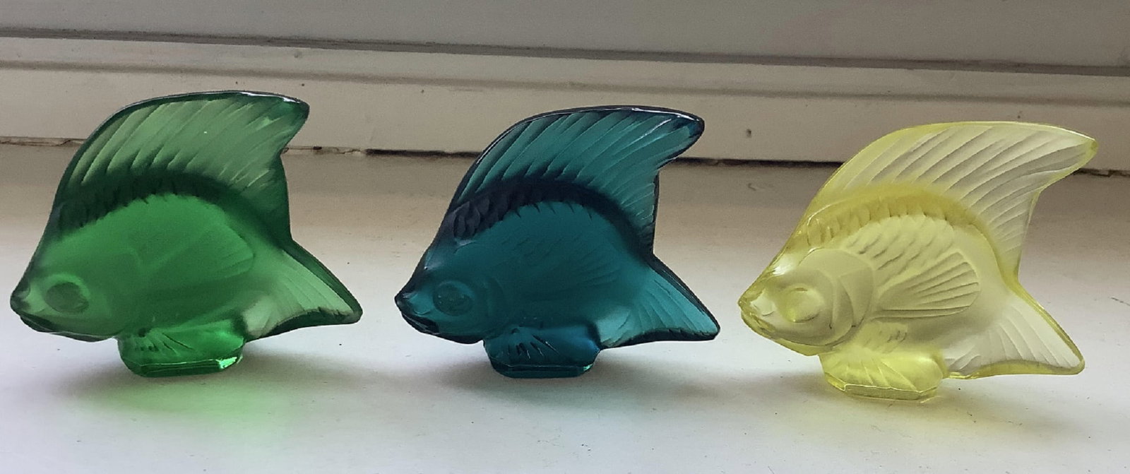 Lalique Signed Angel Fish Made in France: Lalique Signed Angel Fish Made in France. The fish adds color and whimsy to desks, tables, shelves - anywhere you choose to display it.Height: 1 7/8 inches