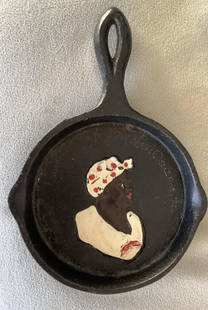 Black Americana Aunt Jemima cast iron egg skillet: Black Americana Aunt Jemima cast iron egg skillet. Measures approx 4.25 inches