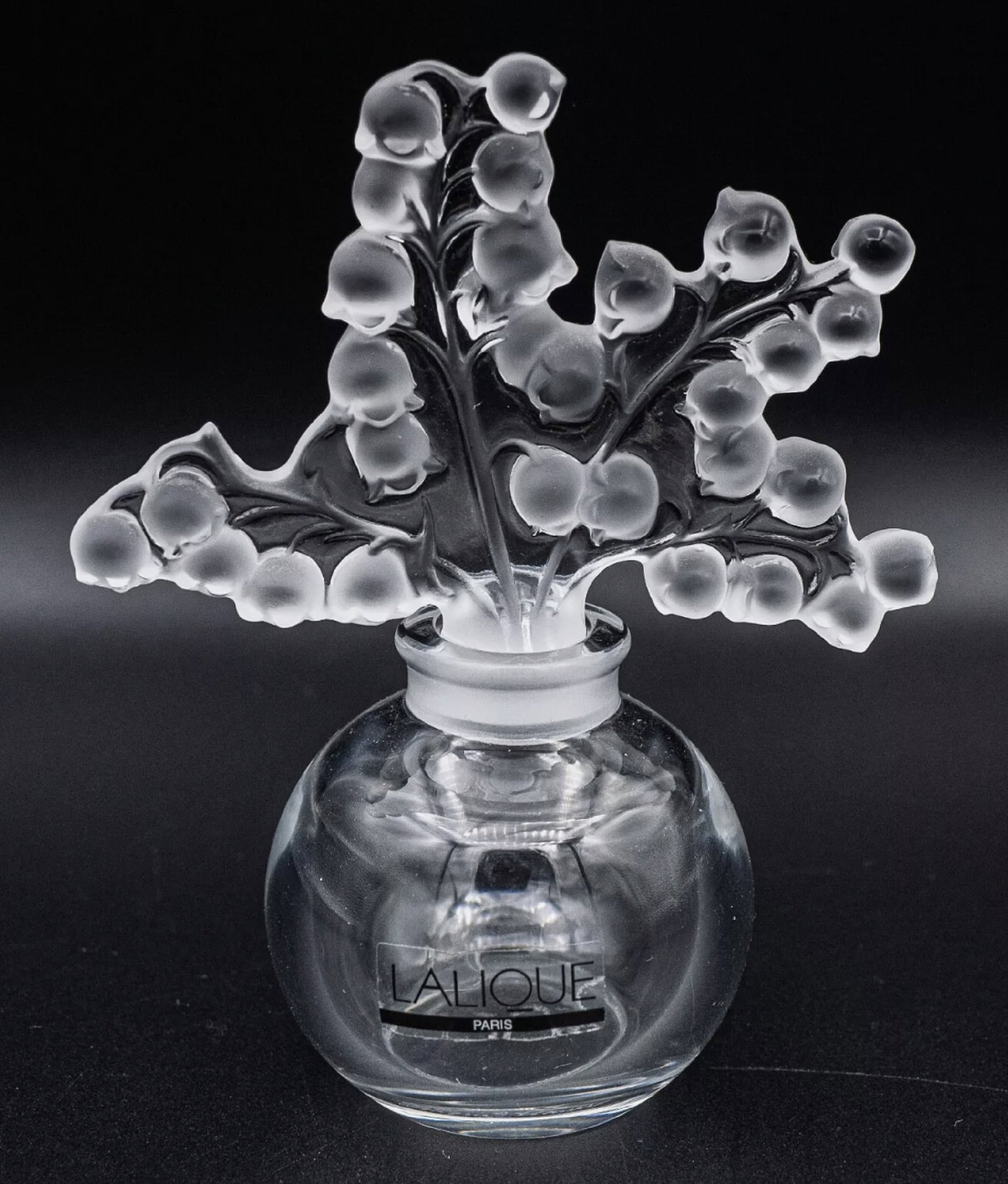 LALIQUE SIGNED CRYSTAL CLAIRFONTAINE LILY OF THE VALLAEY PERFUME BOTTLE MADE IN FRANCE: LALIQUE SIGNED CRYSTAL CLAIRFONTAINE LILY OF THE VALLAEY PERFUME BOTTLE MADE IN FRANCE. No Chips or cracks Measurements: approx. 4 5/8" High