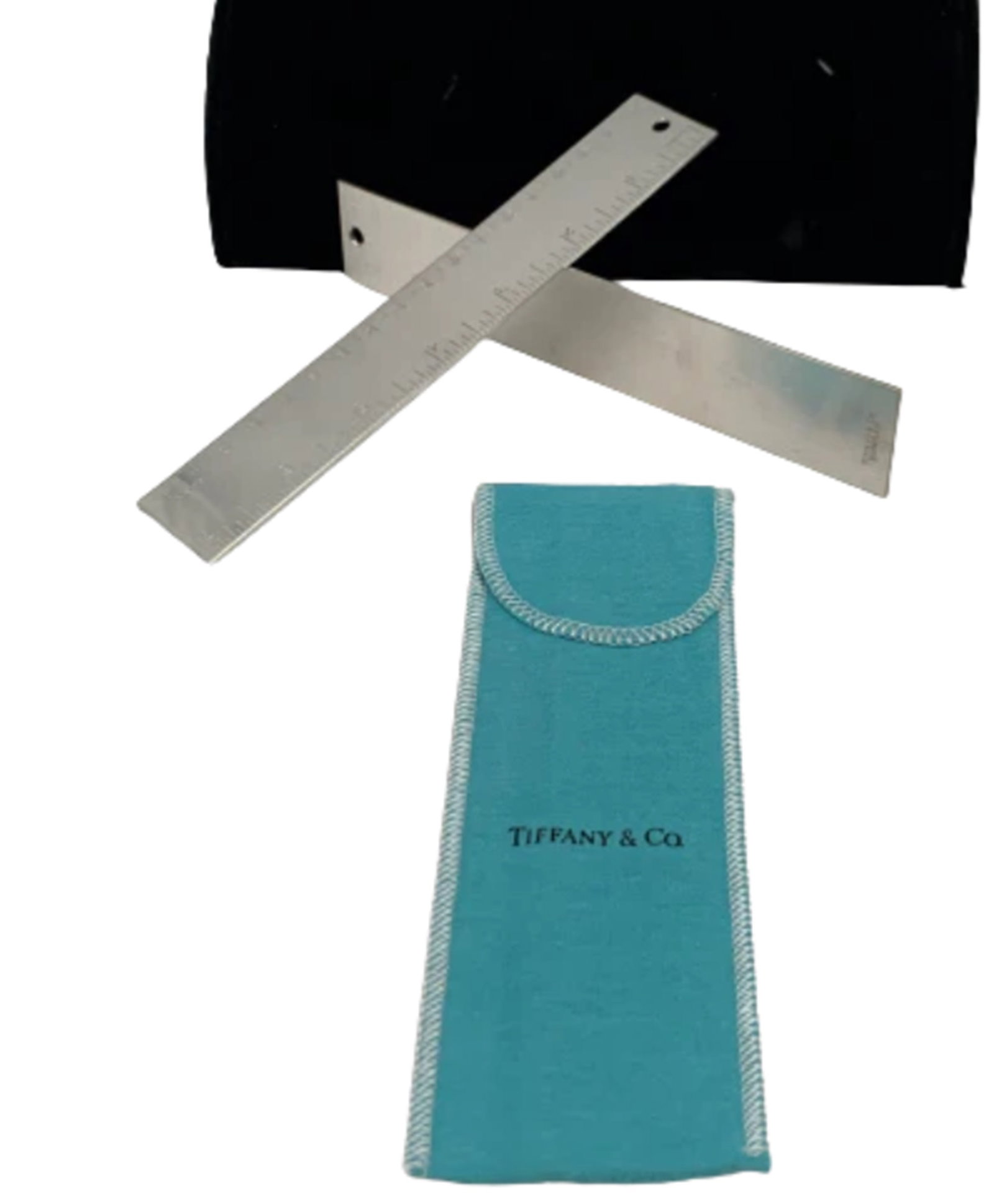 Tiffany & Co. Pair of Silver Metric Rulers in Classic Tiffany-Blue Pouch: Set of 2 Tiffany & Co. silver plate metric rulers measuring 7 inches (17 centimeters) long. Comes in an authentic Tiffany & Co. branded aqua-colored felt pouch. Brand new condition.