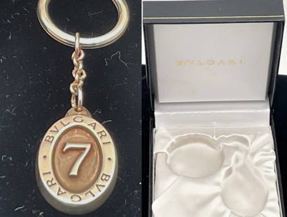 Bulgari Bvlgari Sterling Silver Lucky 7 Keychain New in Box: Bulgari Bvlgari Sterling Silver Lucky 7 Keychain New in Box. Bulgari sterling silver keychain in heavy gage silver. It measures 3 3/4'' in total length by 7/8'' in width at the largest point by 1/8''