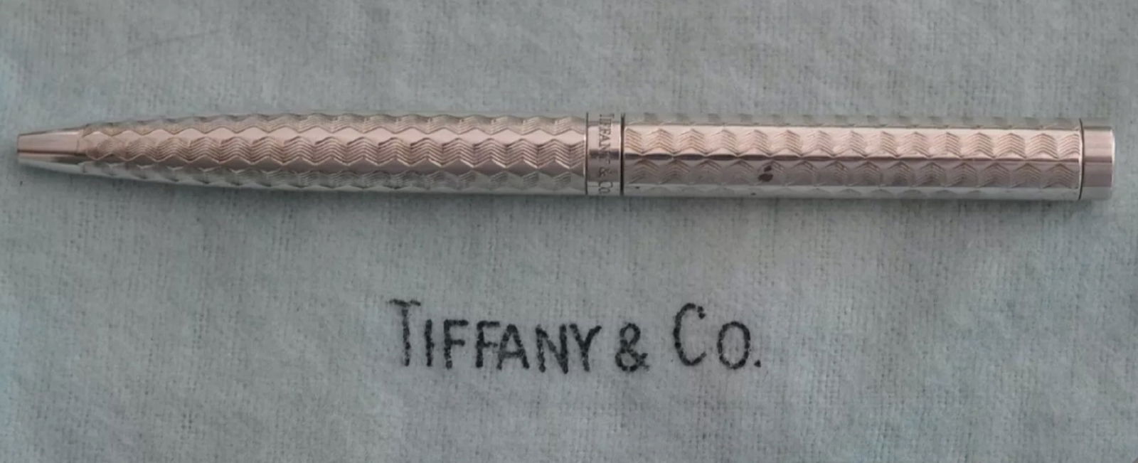 Tiffany & Co. Sterling Silver Guilloche Pen Made in Germany: Tiffany & Co. Sterling Silver Guilloche Pen Made in Germany. Measures approx. 4 1/8".