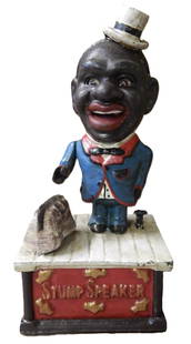 Black Americana Cast Iron Mechanical Bank Stump Speaker: Black Americana Cast Iron Mechanical Bank Stump Speaker Repro Collection of 1930 Measures approx 4 inches by 5 inches Coin is placed in the hand. Pressing the small knob on top of the box lowers the