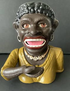 Black Americana Dinah Cast Iron Mechanical Bank: Black Americana Dinah Cast Iron Mechanical Repro Collection of 1930 Measures approx 7 inches by 6 inches Coin is placed in the hand. Pressing the small knob on top of the box lowers the arm and