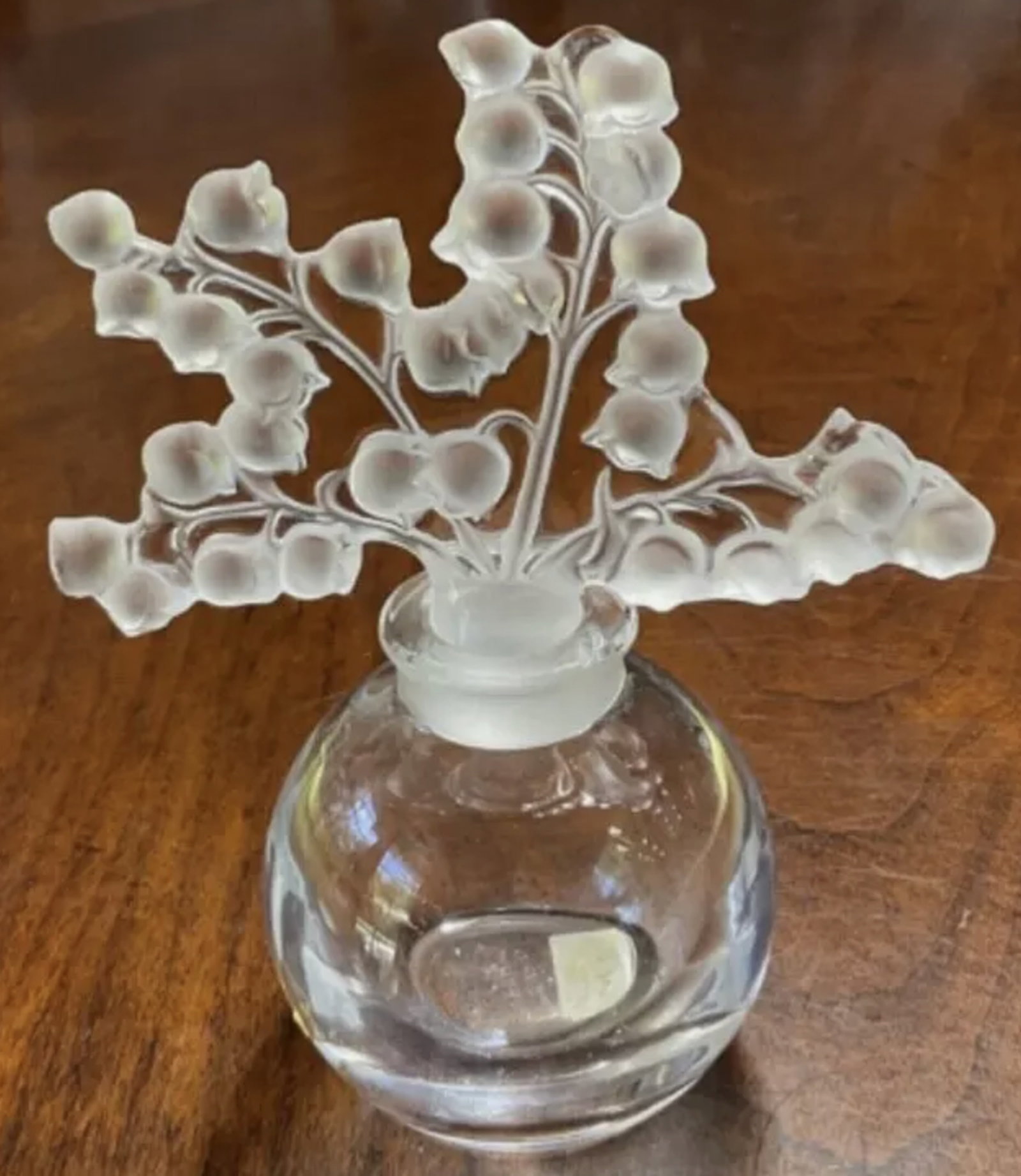 LALIQUE SIGNED CRYSTAL CLAIRFONTAINE LILY OF THE VALLAEY PERFUME BOTTLE MADE IN FRANCE: LALIQUE SIGNED CRYSTAL CLAIRFONTAINE LILY OF THE VALLAEY PERFUME BOTTLE MADE IN FRANCE. No Chips or cracks Measurements: approx. 4 5/8" High