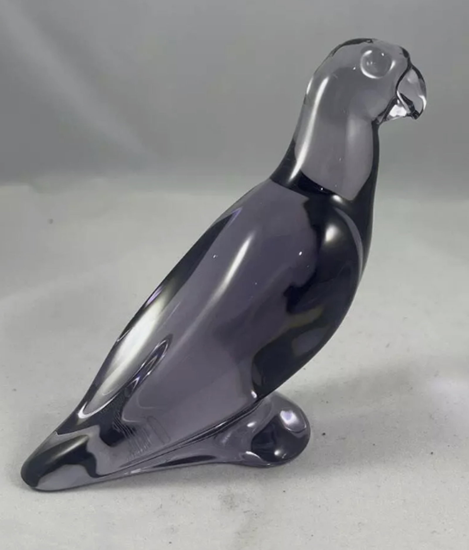 Baccarat Signed Amethyst Parrot Made in France: Baccarat Signed Amethyst Parrot Made in France. Measures approx Approx, 4" H x 2.25" W x 2.25" D