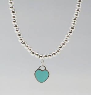 Tiffany & Co. Sterling Silver Blue Enamel Heart pendant with Beaded Chain Necklace And Box: Tiffany & Co. Sterling Silver Blue Enamel Heart pendant with Beaded Chain Necklace And Pouch. Measures approx 18 inches