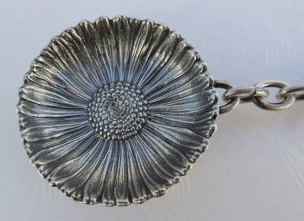 Buccellati Sterling Daisy Dish Key Chain Made In Italy: Buccellati Sterling Daisy Dish Key Chain Made In Italy SIZE: DAISY DISH IS APPROXIMATELY 1 3/4" WIDE TOTAL LENGTH 4 1/2". WEIGHT: 41 GRAMS.CONDITION: EXCELLENT VINTAGE CONDITION WITH ONLY MINOR AGE