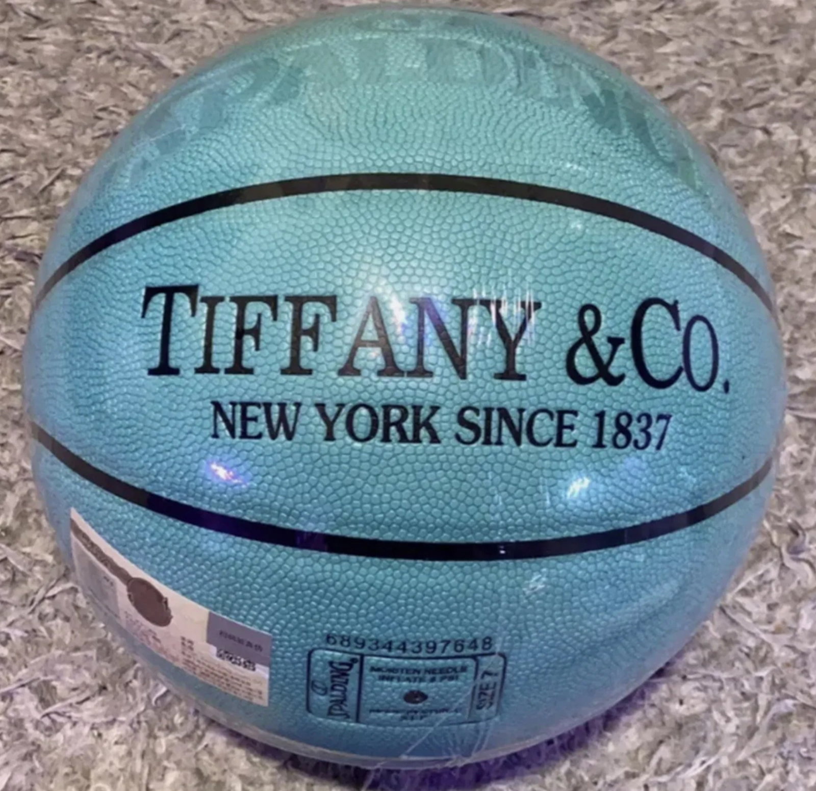 Tiffany Co X Spalding basketball Limited Edtion Size 7: limited edition Tiffany Co X Spaulding basketball Size 7. Featuring the iconic Tiffany Blue color, this ball is perfect for basketball enthusiasts and collectors alike. The ball is designed for use in
