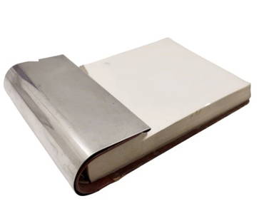 Cartier Sterling Silver Notepad Holder: Cartier Sterling Silver Notepad Holder. Rare Cartier, sterling silver notepad holder, measuring 3 5/8'' in length by 1 5/8'' in width by 1 1/8'' in height, and bearing hallmarks as shown.