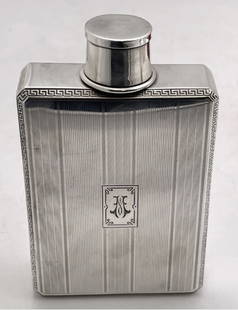 George Henckel & Co. Sterling Silver Flask with Collapsible Shot Glass from Early 20th Century: George Henckel & Co. Sterling Silver Flask with Collapsible Shot Glass from Early 20th Century. The flask measures 5'' by 3'' by 1 1/8'', can contain 2 pints, weighs 5.3 troy ounces, and bears
