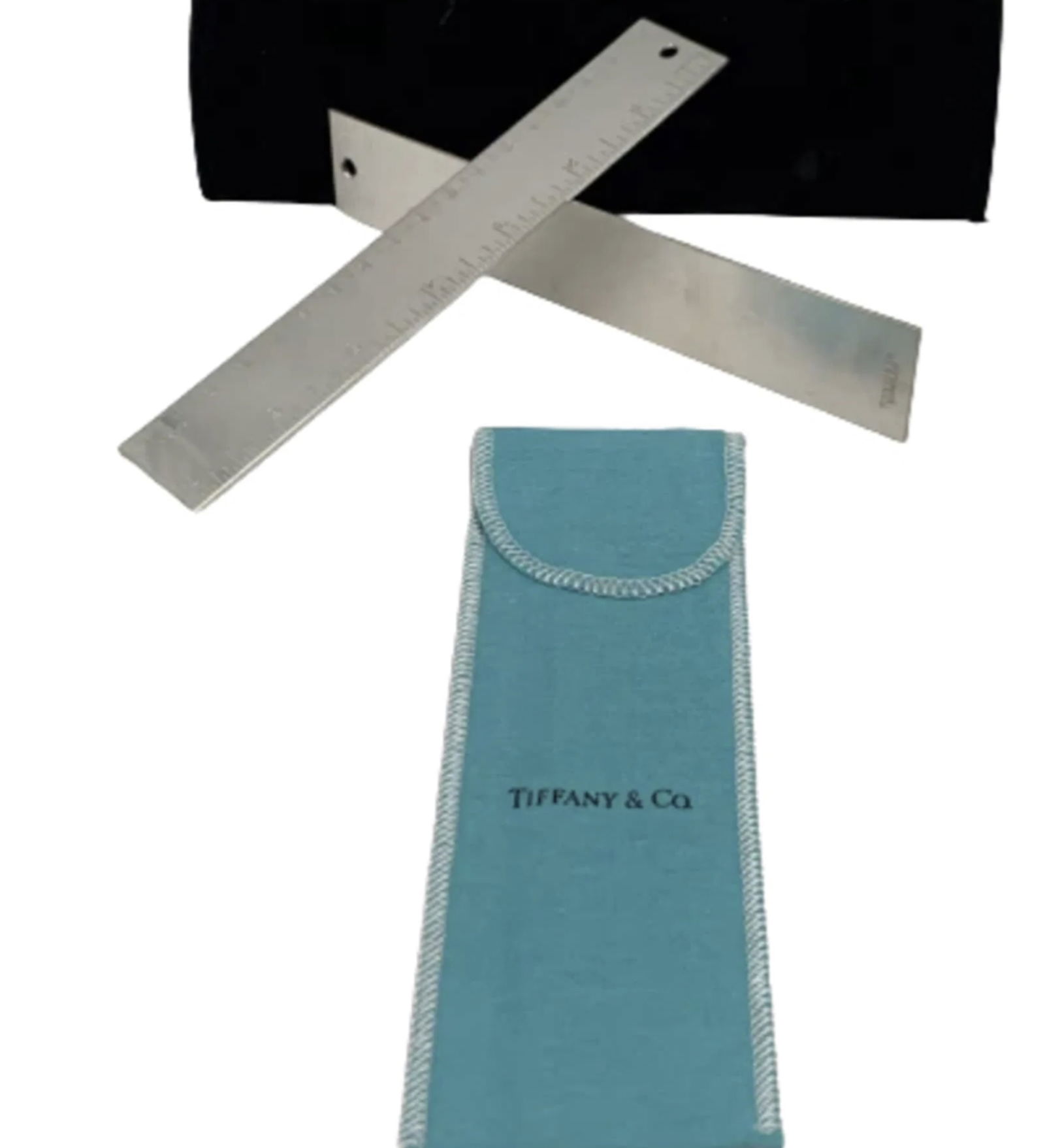 Tiffany & Co. Pair of Silver Metric Rulers in Classic Tiffany-Blue Pouch: Tiffany & Co. Pair of Silver Metric Rulers in Classic Tiffany-Blue Pouch. Set of 2 Tiffany & Co. silver plate metric rulers measuring 7 inches (17 centimeters) long. Comes in an authentic Tiffany & Co