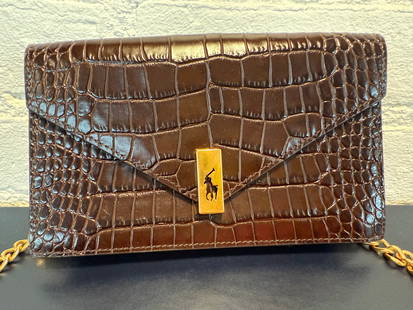 Polo Ralph Lauren Crossbody/Clutch. Brown Embossed Calfskin Leather: Polo Ralph Lauren Crossbody/Clutch. Brown Embossed Calfskin Leather small measures approx 7.25"x4.5"x1.5"Can tuck the gold chain into the bag for evening clutch or wear crossbody. Interior