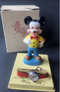 Ingersoll MICKEY MOUSE WRIST WATCH Plastic Figure Box Disney Works 1960: Ingersoll MICKEY MOUSE WRIST WATCH Plastic Figure Box Disney Works Circa 1960's Mickey Mouse wristwatch by Ingersoll with original packaging.As you can see the band layers has split on the lower